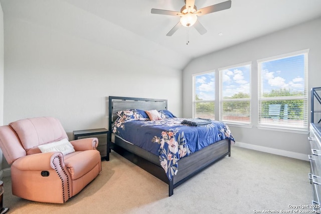 355 Jereth, Castroville, TX 78009 - bedroom featuring baseboards, light colored carpet, a ceiling fan, and vaulted ceiling