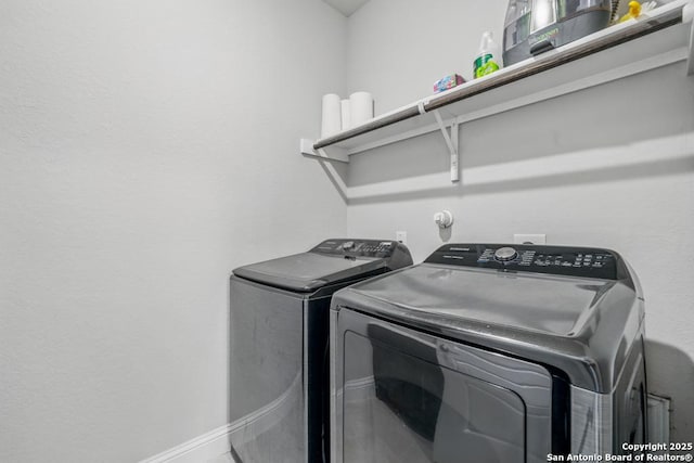 355 Jereth, Castroville, TX 78009 - clothes washing area featuring separate washer and dryer and baseboards