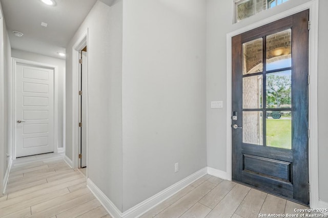 355 Jereth, Castroville, TX 78009 - entryway with light wood-style floors, baseboards, and recessed lighting