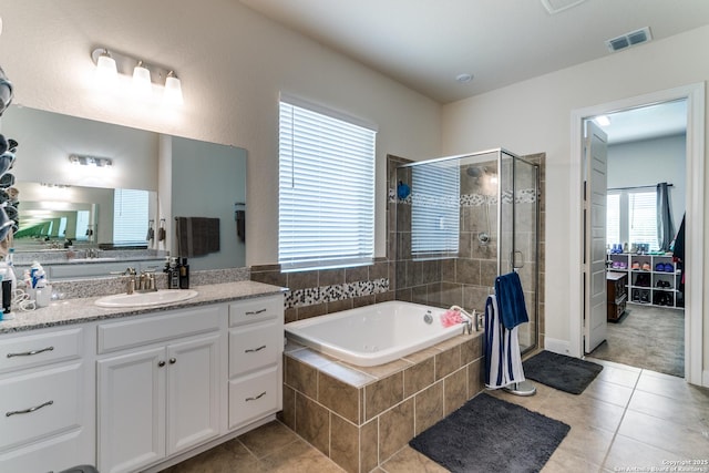 29121 Ismorada, San Antonio, TX 78260 - bathroom with tile patterned floors, a garden tub, a shower stall, and vanity