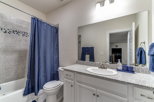 29121 Ismorada, San Antonio, TX 78260 - full bathroom with toilet, vanity, and shower / bath combo