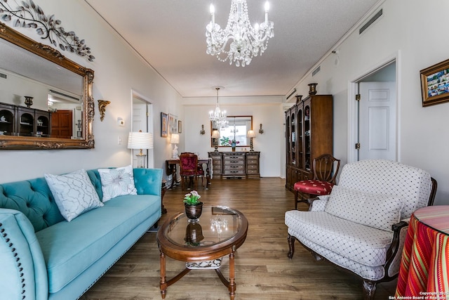 1 Towers Park Ln Unit 907, San Antonio, TX 78209 - living area featuring a chandelier and wood finished floors