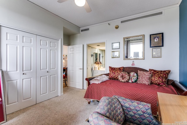 1 Towers Park Ln Unit 907, San Antonio, TX 78209 - carpeted bedroom featuring a closet, ceiling fan, and ensuite bath
