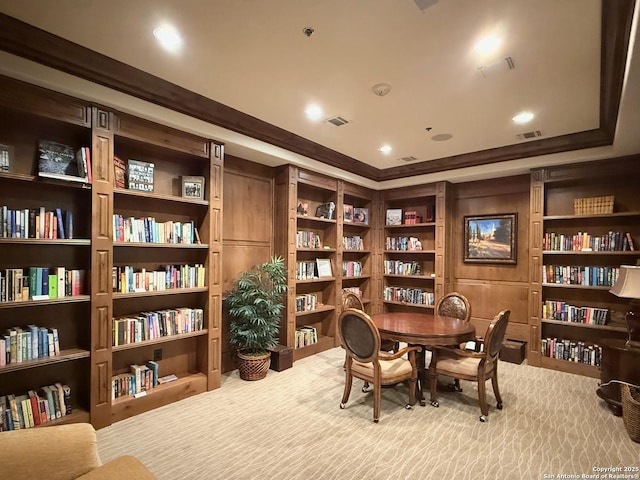4419 Tapia, San Antonio, TX 78261 - sitting room featuring bookshelves, a raised ceiling, and carpet flooring