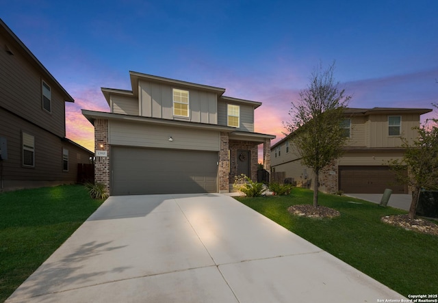 13915 Jasperoid, San Antonio, TX 78253 - traditional-style house with a garage, brick siding, driveway, and a lawn