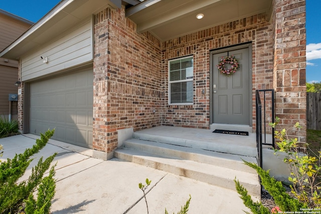 13915 Jasperoid, San Antonio, TX 78253 - property entrance with brick siding, an attached garage, and driveway