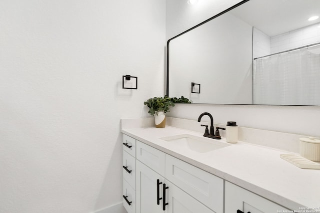 187 Stone Loop, Castroville, TX 78009 - full bath featuring vanity, curtained shower, and recessed lighting