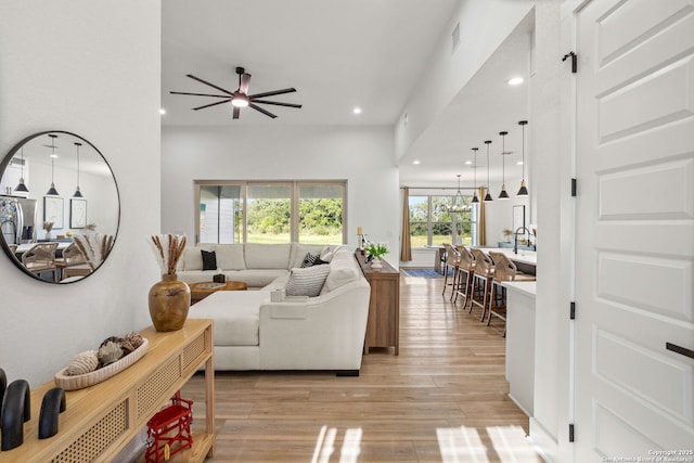 187 Stone Loop, Castroville, TX 78009 - living room with light wood-style flooring, ceiling fan, and recessed lighting