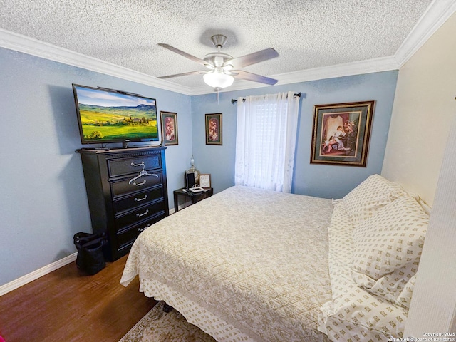 602 Hortencia Ave, San Antonio, TX 78237 - bedroom featuring dark wood finished floors, ornamental molding, a textured ceiling, a ceiling fan, and baseboards