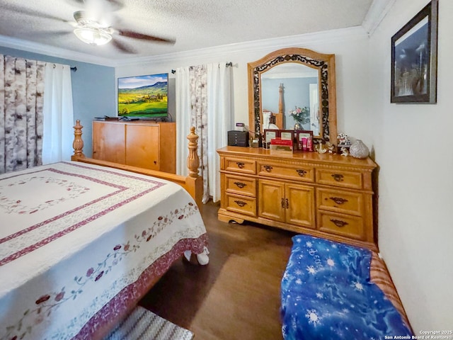 602 Hortencia Ave, San Antonio, TX 78237 - bedroom featuring ornamental molding, ceiling fan, a textured ceiling, and dark carpet