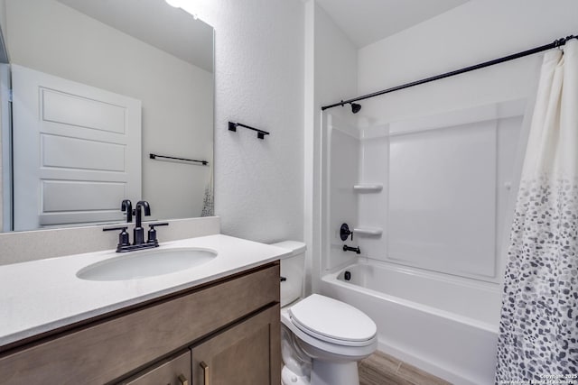 12531 Yancey, San Antonio, TX 78253 - full bathroom featuring toilet, vanity, shower / bath combo with shower curtain, and a textured wall