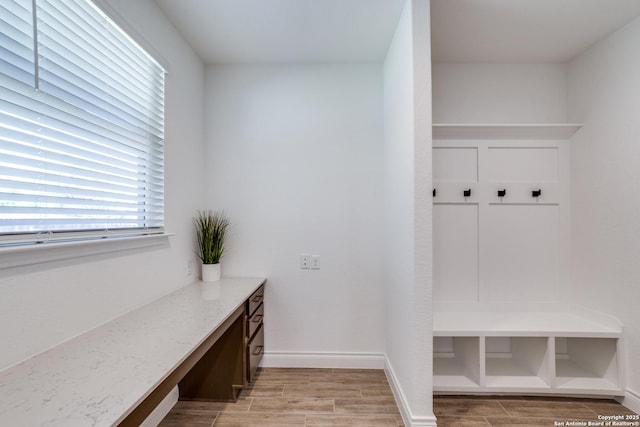 12531 Yancey, San Antonio, TX 78253 - mudroom with wood tiled floors, baseboards, and built in study area