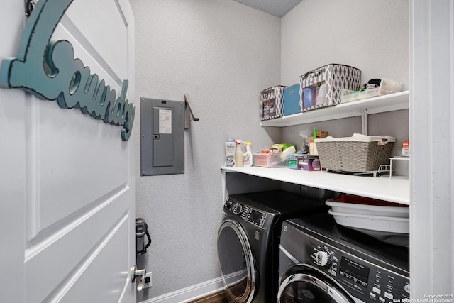 27210 Camellia, Boerne, TX 78015 - laundry area with washing machine and dryer, electric panel, a textured wall, and baseboards