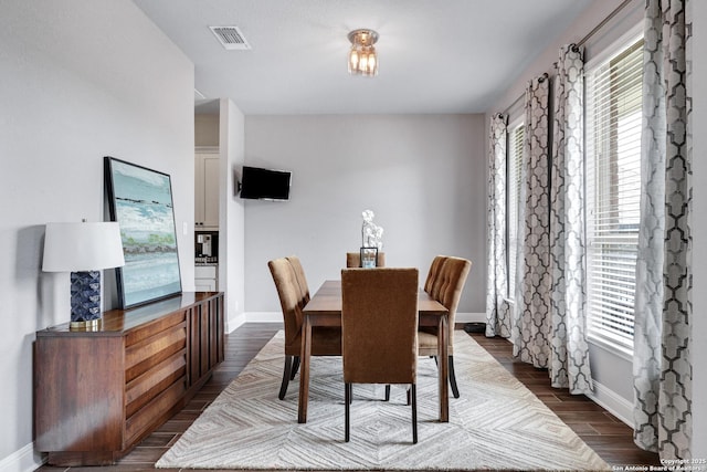 27210 Camellia, Boerne, TX 78015 - dining area with baseboards and dark wood-type flooring