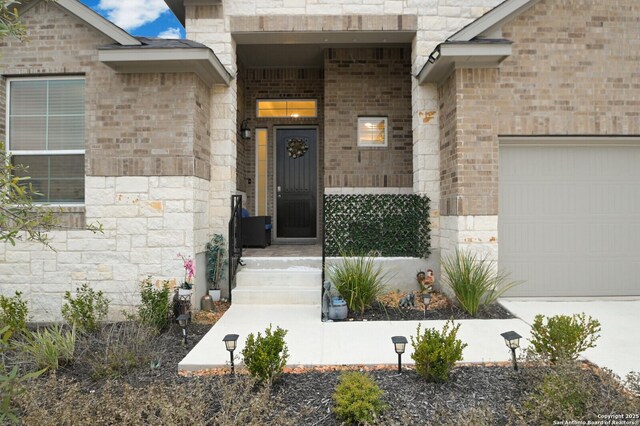 4609 Shackelford, Schertz, TX 78108 - doorway to property with an attached garage, brick siding, and stone siding