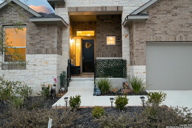 4609 Shackelford, Schertz, TX 78108 - property entrance featuring a garage and brick siding