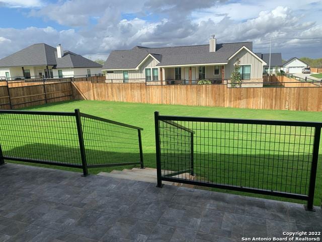 128 Woodbridge Ln, Vernia, TX 78121 - view of yard featuring a residential view