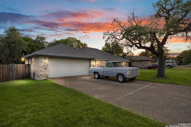 104 Holly Hl, Ingram, TX 78025 - ranch-style home featuring driveway, brick siding, an attached garage, and roof with shingles