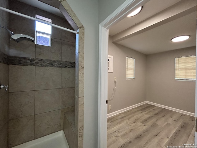 270 Oelkers, San Antonio, TX 78204 - full bathroom with a shower stall, wood finished floors, and baseboards