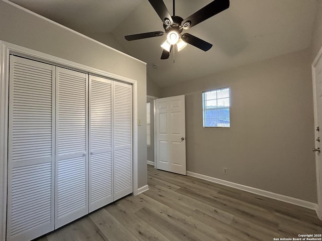 270 Oelkers, San Antonio, TX 78204 - unfurnished bedroom featuring vaulted ceiling, a closet, light wood-style floors, baseboards, and a ceiling fan