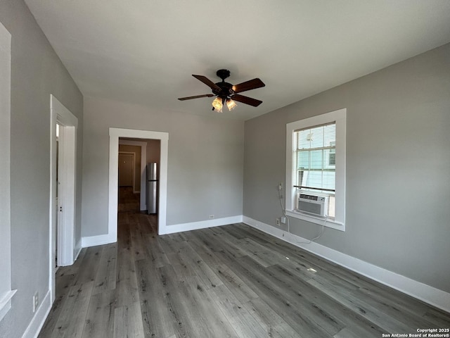 270 Oelkers, San Antonio, TX 78204 - empty room with wood finished floors, a ceiling fan, cooling unit, and baseboards