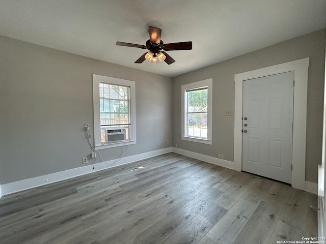 270 Oelkers, San Antonio, TX 78204 - foyer entrance featuring wood finished floors, cooling unit, a ceiling fan, and baseboards