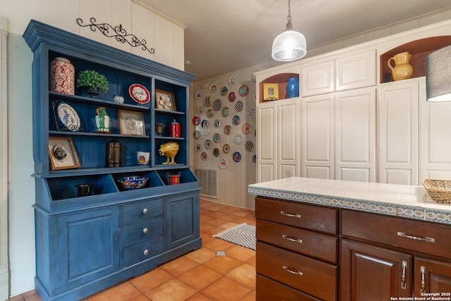 529 N High, Uvalde, TX 78801 - kitchen featuring open shelves and light tile patterned floors