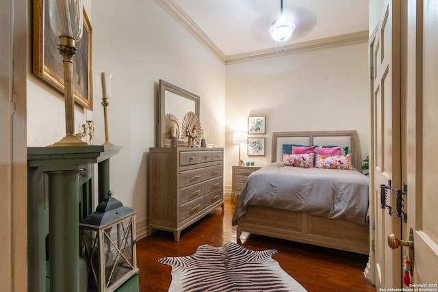 529 N High, Uvalde, TX 78801 - bedroom featuring ornamental molding, dark wood-type flooring, and baseboards