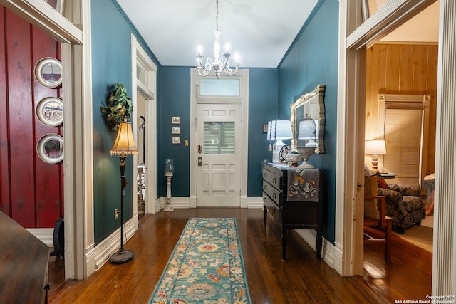 529 N High, Uvalde, TX 78801 - foyer featuring a chandelier and dark wood-style flooring
