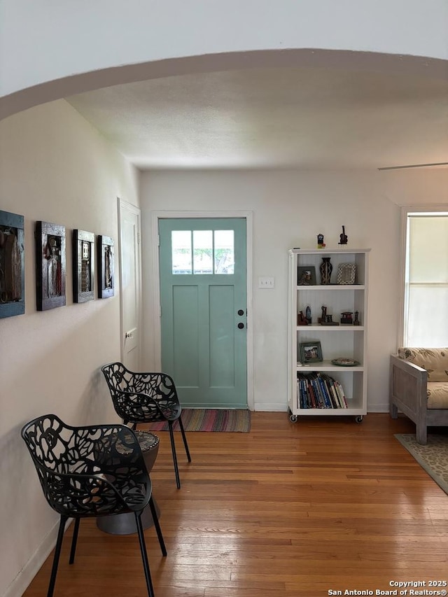 345 Westminster, San Antonio, TX 78228 - entryway featuring wood finished floors, arched walkways, and baseboards