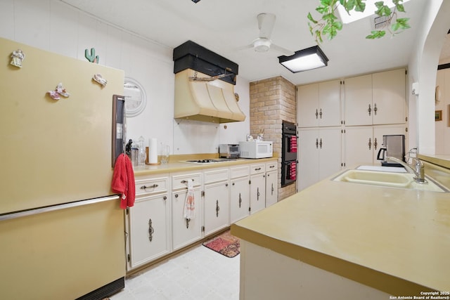 4006 Glenrock, San Antonio, TX 78240 - kitchen with white appliances, a sink, custom exhaust hood, and light countertops