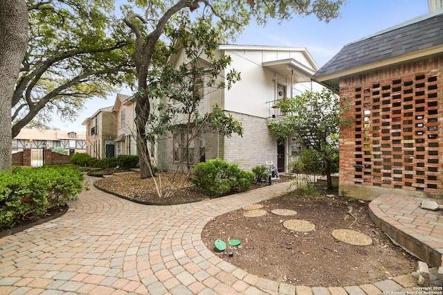 2811 Woodbury Unit 106, San Antonio, TX 78217 - view of side of property featuring brick siding