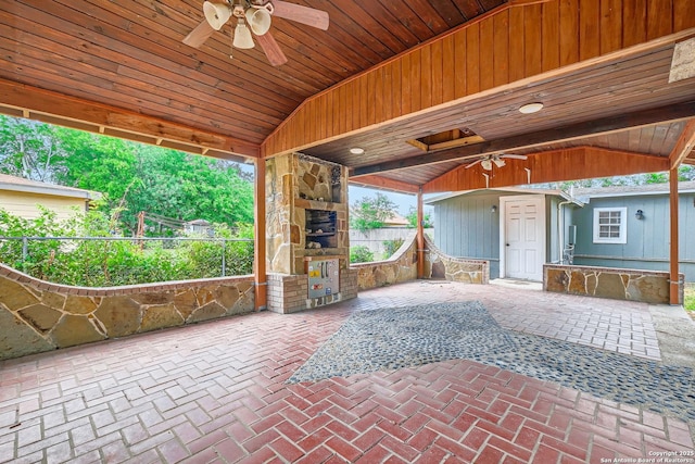 1022 Vickers Ave, San Antonio, TX 78211 - view of patio / terrace with a fireplace and a ceiling fan