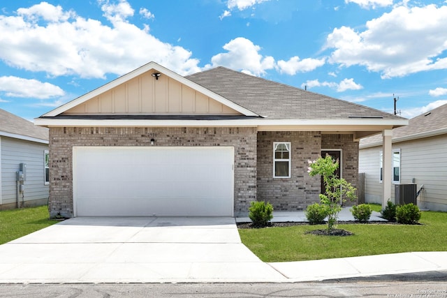 7910 Asp Pt, San Antonio, TX 78253 - single story home featuring brick siding, driveway, a front yard, and a garage