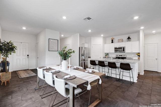 7910 Asp Pt, San Antonio, TX 78253 - dining space with recessed lighting and baseboards