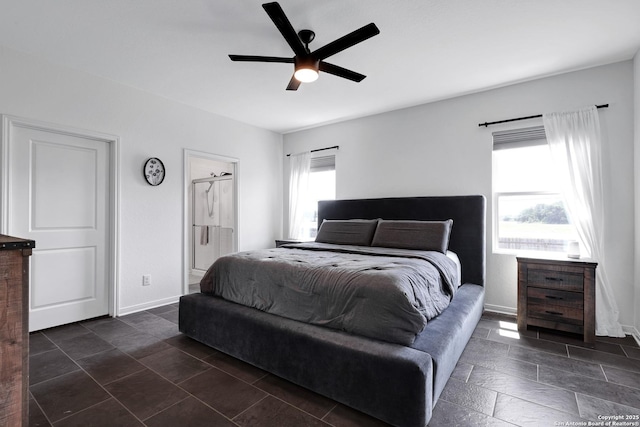 7910 Asp Pt, San Antonio, TX 78253 - bedroom with baseboards, ceiling fan, and ensuite bath