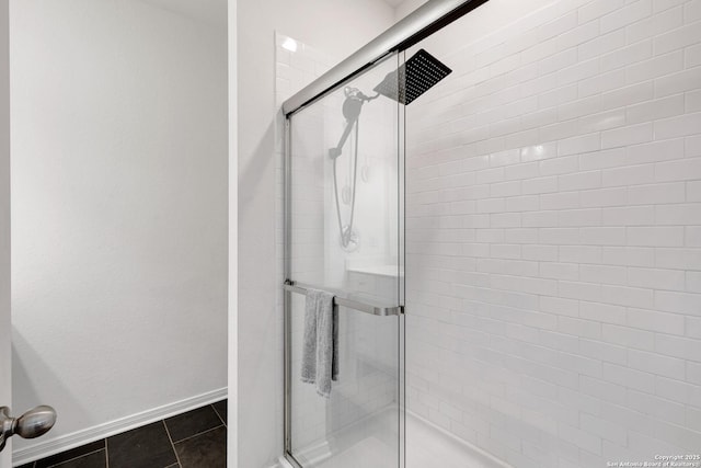 7910 Asp Pt, San Antonio, TX 78253 - bathroom featuring a stall shower and baseboards