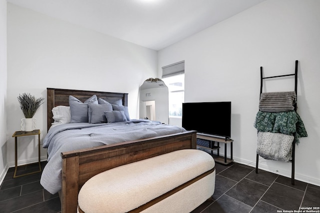 7910 Asp Pt, San Antonio, TX 78253 - bedroom with dark tile patterned floors and baseboards