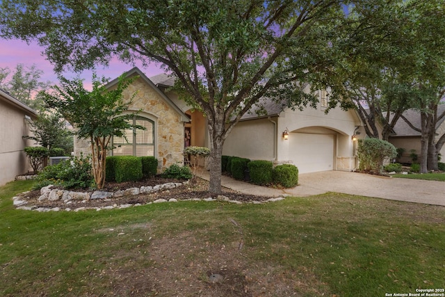 143 Roseheart, San Antonio, TX 78259 - view of front of property featuring stone siding, driveway, a front yard, and stucco siding
