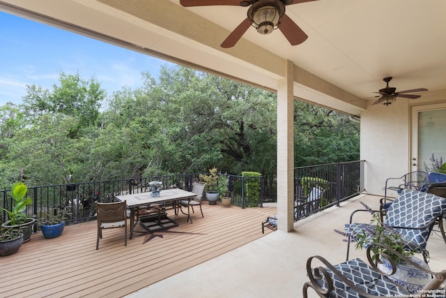 143 Roseheart, San Antonio, TX 78259 - wooden deck featuring ceiling fan, outdoor dining area, and view of scattered trees