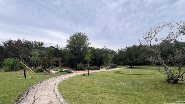 143 Roseheart, San Antonio, TX 78259 - view of community featuring an area to practice putting, a pergola, and a yard
