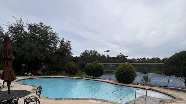 143 Roseheart, San Antonio, TX 78259 - community pool featuring a patio area