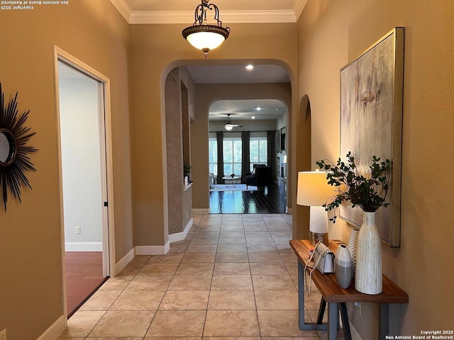 143 Roseheart, San Antonio, TX 78259 - hallway featuring arched walkways, ornamental molding, and light tile patterned floors