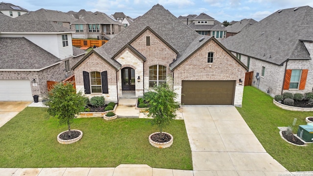 12424 Upton Park, San Antonio, TX 78253 - french provincial home with brick siding, a residential view, driveway, and a shingled roof