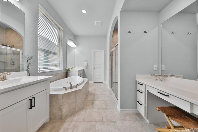 12424 Upton Park, San Antonio, TX 78253 - bathroom with a shower stall, a garden tub, tile patterned floors, and two vanities