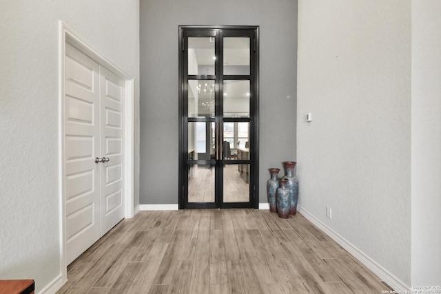 12424 Upton Park, San Antonio, TX 78253 - empty room with wood finished floors, baseboards, and french doors