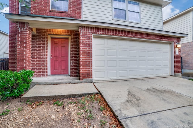 11023 Gilpin, Helotes, TX 78023 - doorway to property with brick siding and concrete driveway