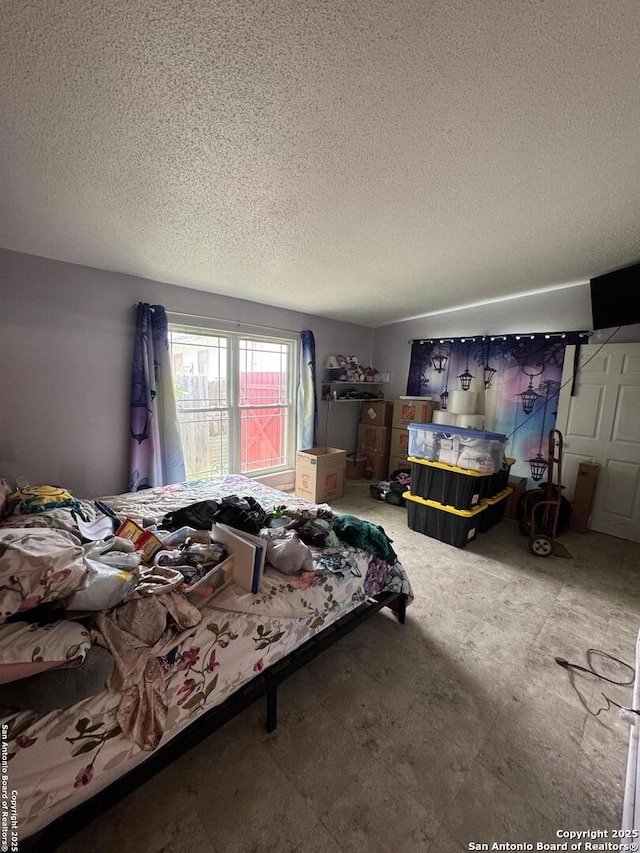 1702 Westmar, San Antonio, TX 78227 - bedroom with a textured ceiling