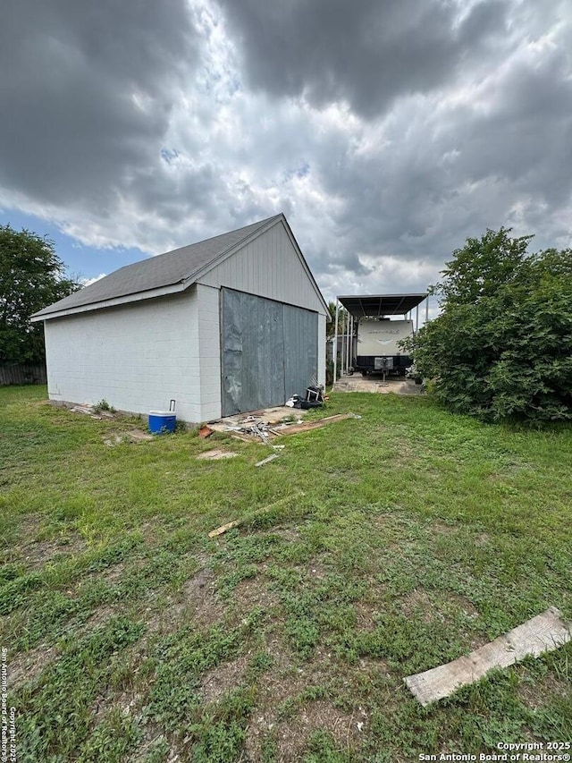 1702 Westmar, San Antonio, TX 78227 - view of pole building with a yard and a carport