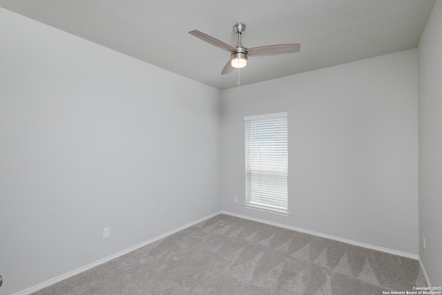 14703 Running Wolf, San Antonio, TX 78245 - carpeted spare room featuring baseboards and ceiling fan